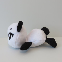 Peluche panda noire et blanche, vue de profil